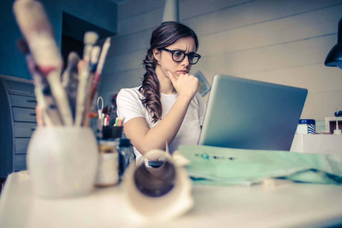 young-woman looking perplexed at her computer