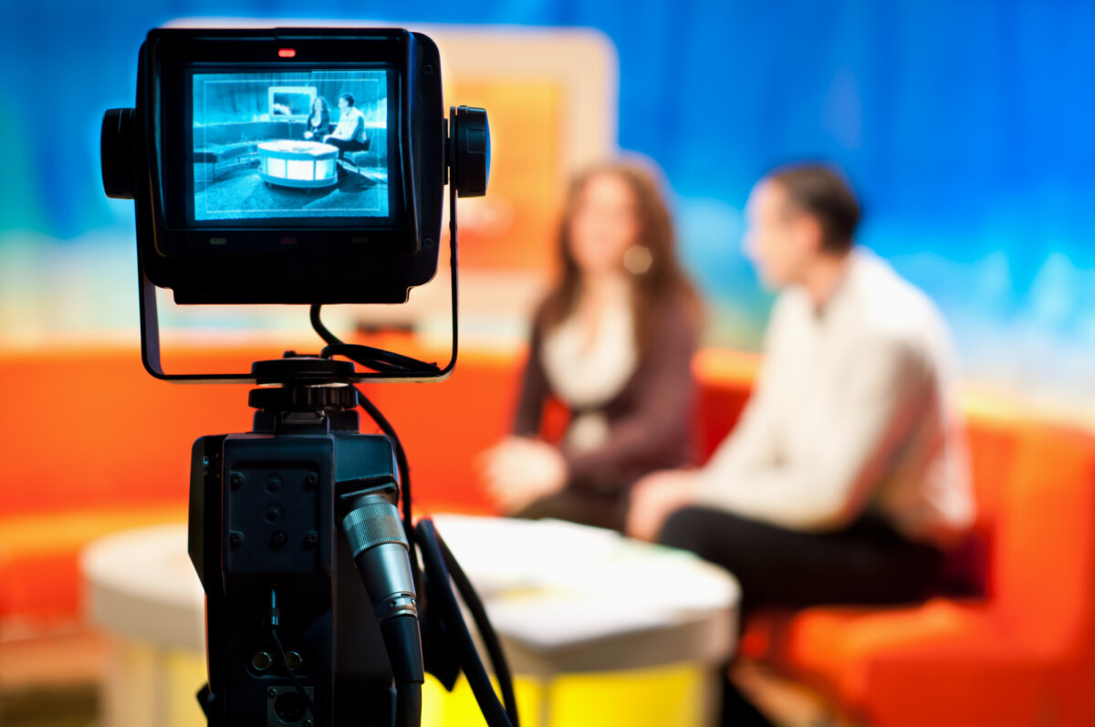 Video camera viewfinder - recording show in TV studio - focus on camera